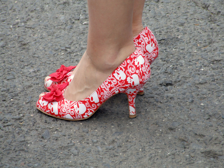 Red Court Shoes Decorated With Skull and Ribbonの写真素材