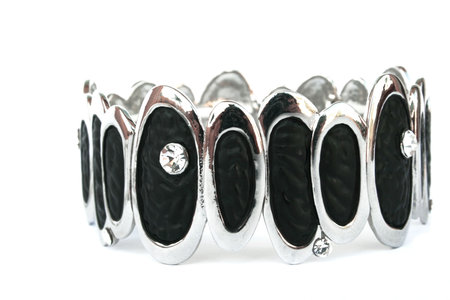 Silver bracelet with black ornament isolated on the white.の写真素材
