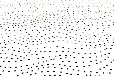 Black holes on white painted metallic plate.の写真素材