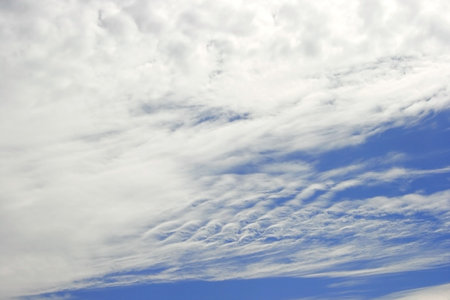White clouds in blue sky.