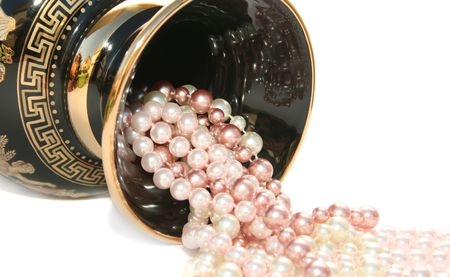 Greek vase with beads isolated on white background.の写真素材