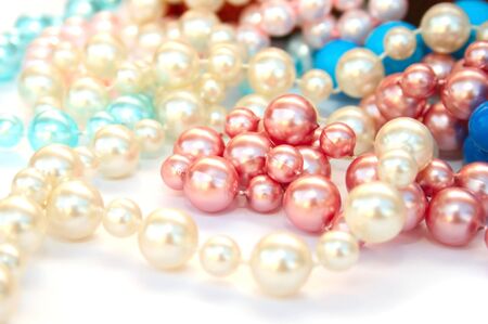 Colorful necklaces on white background.の写真素材