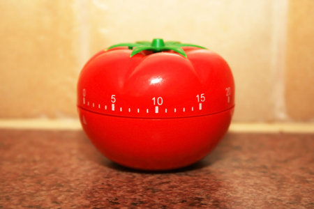 Red tomato kitchen timer.の写真素材