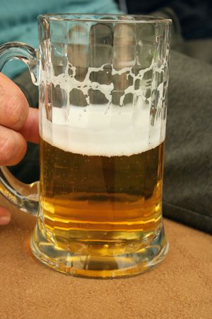 Beer in man hand.の写真素材