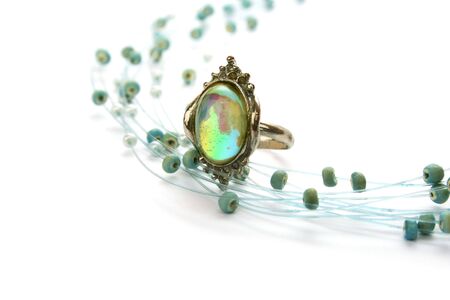 Ring and necklace isolated on white background.の写真素材