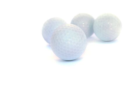Golf balls isolated on white background.の写真素材