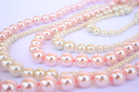 Necklaces on gray background.の写真素材