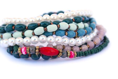 Bracelets and necklaces isolated on white background.の写真素材