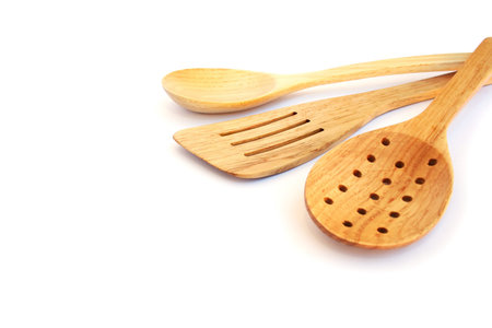 Wooden kitchen devices isolated on white background.