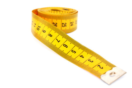 Yellow measuretape isolated on white background.