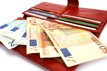 Money in wallet isolated on white background.の写真素材