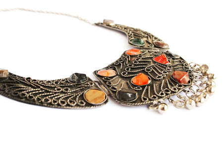 Armenian ancient style necklace with natural stones isolated on white background.