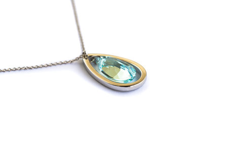 Necklace with blue stone isolated on white background.の写真素材