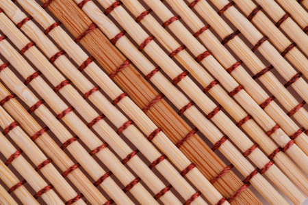 Wooden placemat texture for background, close-up image.