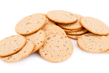 Pile of round cookies isolated on white background.の写真素材