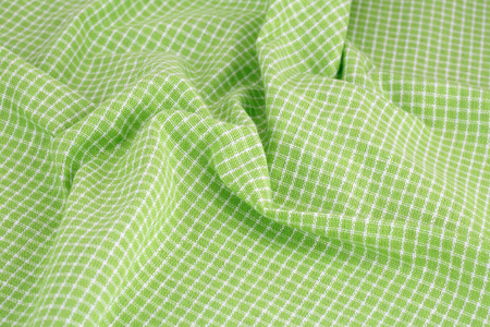 Checkered tablecloth texture as a background, closeup picture.の写真素材