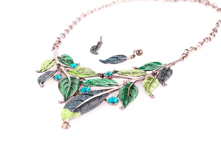 Stylish necklace and earrings isolated on white background.の写真素材