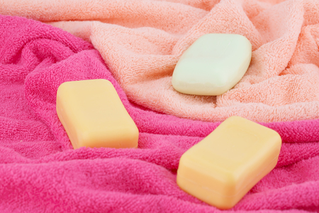 Colorful towels and soaps closeup picture.の写真素材