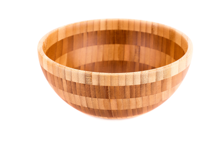 Empty bamboo bowl isolated on white background.の写真素材