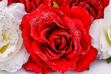 Red and white fabric roses closeup picture.の写真素材