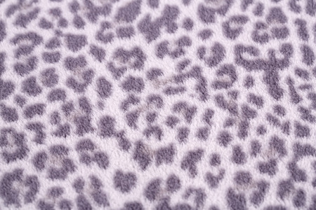 Spotted fabric background closeup picture.の写真素材