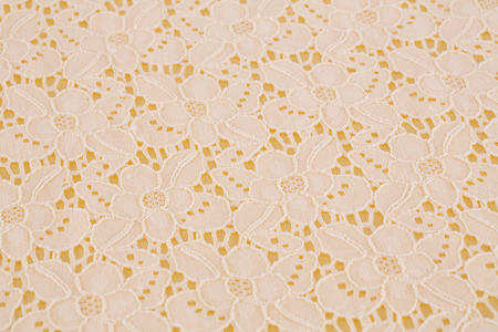 Yellow fabric background closeup picture.の写真素材