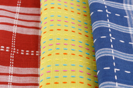 Colorful kitchen towels closeup picture.