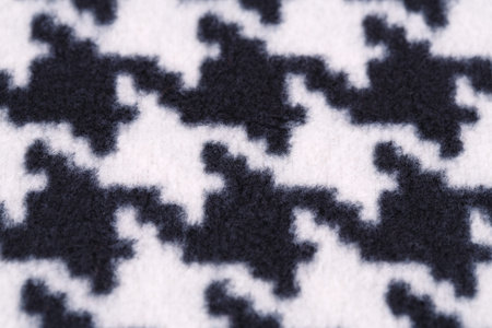 Black and white fabric background closeup picture.
