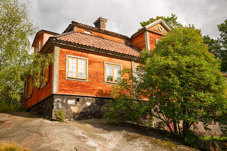 Traditional old house at Skansen, the first open-air museum and zoo, located on the island Djurgarden in Stockholm, Sweden.の写真素材