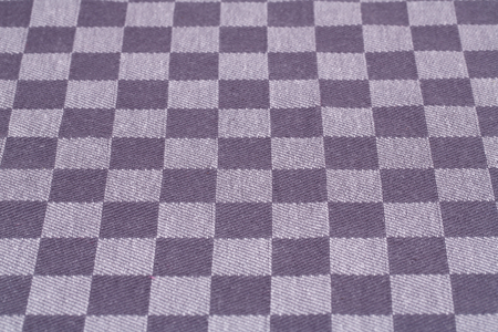 Checkered tablecloth texture as a background, closeup picture.の写真素材
