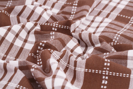 Striped tablecloth texture as a background, closeup picture.