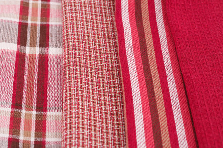 Colorful kitchen towels closeup picture.