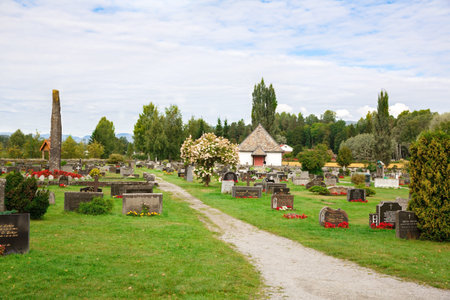 Heddal, Norway-August 15, 2014 -  Old cemetery in Norwegian village near the old church.