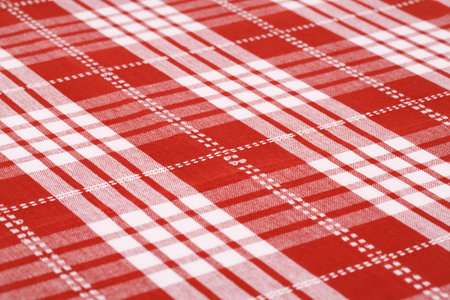 Striped tablecloth texture as a background, closeup picture.