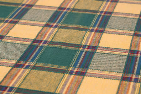 Checkered tablecloth texture as a background, closeup picture.