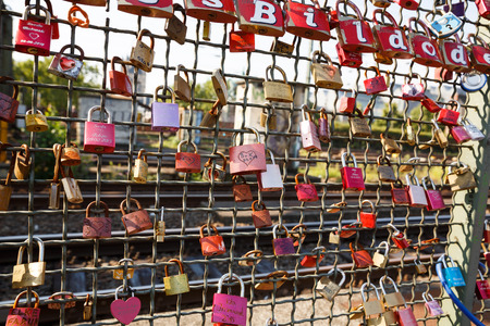 Cologne, Germany- August 22, 2015 - Love lockers on the Hohenzollern Bridge. Loving couples lock a  locker at the fence, then throw the key in Rhine river.の写真素材