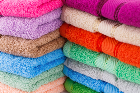 Colorful towels stacks closeup picture.の写真素材