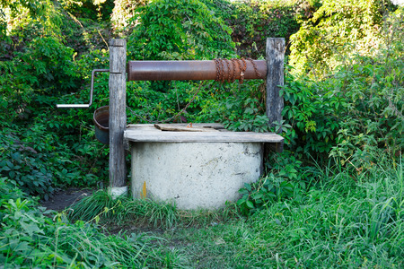 Old water well in the Russian village.の写真素材