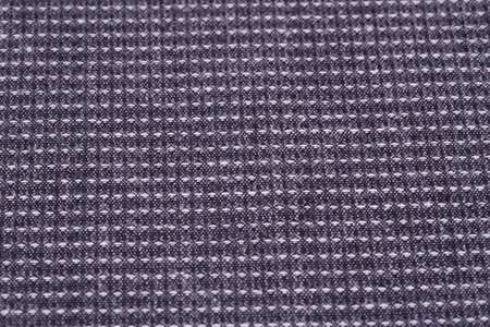 Striped tablecloth texture as a background, closeup picture.
