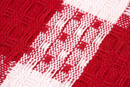 Striped tablecloth texture as a background, closeup picture.
