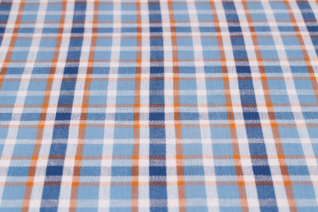 Striped tablecloth texture as a background, closeup picture.