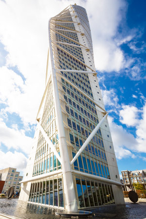 MALMO, SWEDEN - August 20, 2017 -  Turning Torso twisted modern skyscraper on sky background.