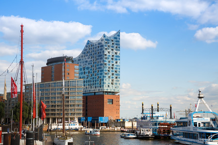 Hamburg, Germany - August 17, 2016 - Elbphilharmonie the concert hall and boats in Hafencity district.のeditorial素材