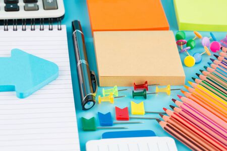 Back to school, stationary on blue background.の写真素材