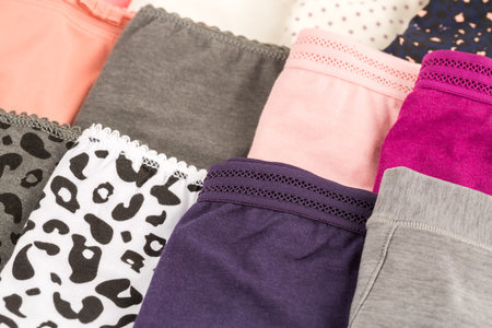 Many colorful panties close up picture.