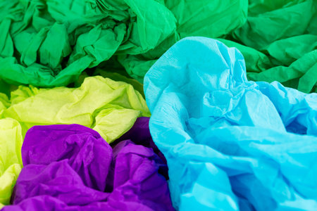 Crumpled colorful crepe papers as a background.の写真素材