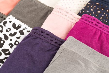 Many colorful panties close up picture.