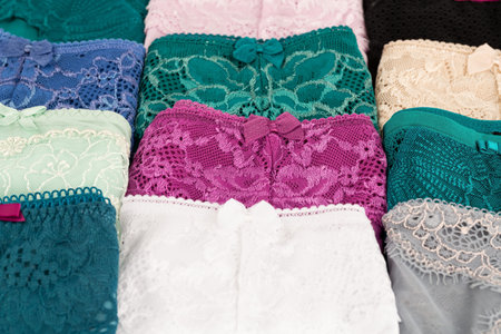 Many colorful panties close up picture.