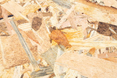 Wooden oriented strand board texture as a background.