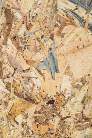 Wooden oriented strand board texture as a background.